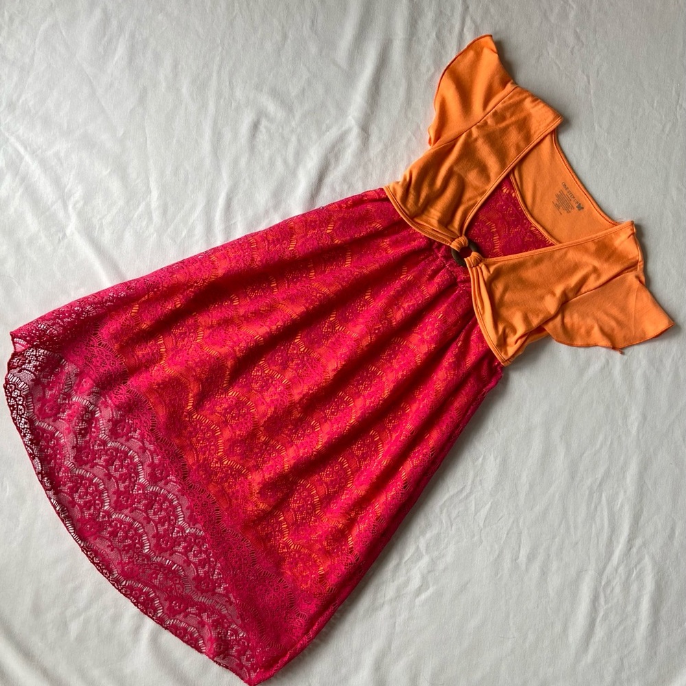 Girl’s pink and orange summer dress